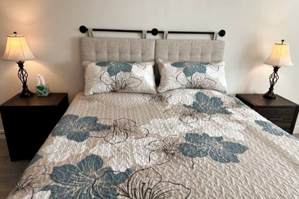 Master bedroom with Sleep Number Split-top King bed.  Ceiling fan.