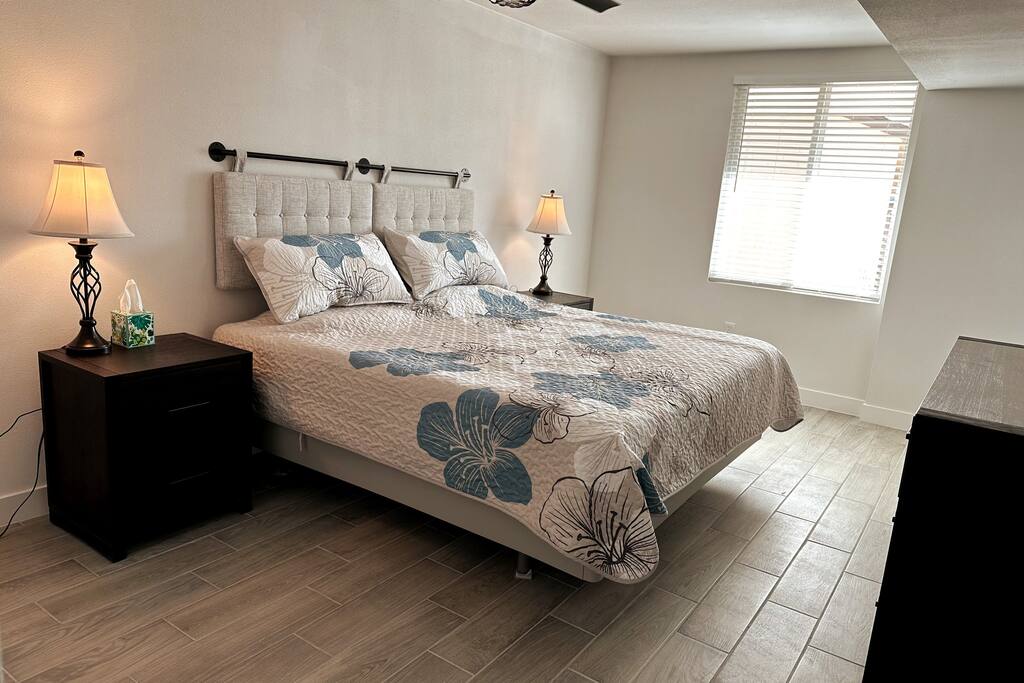 Master bedroom with Sleep Number Split-top King bed.  Ceiling fan.