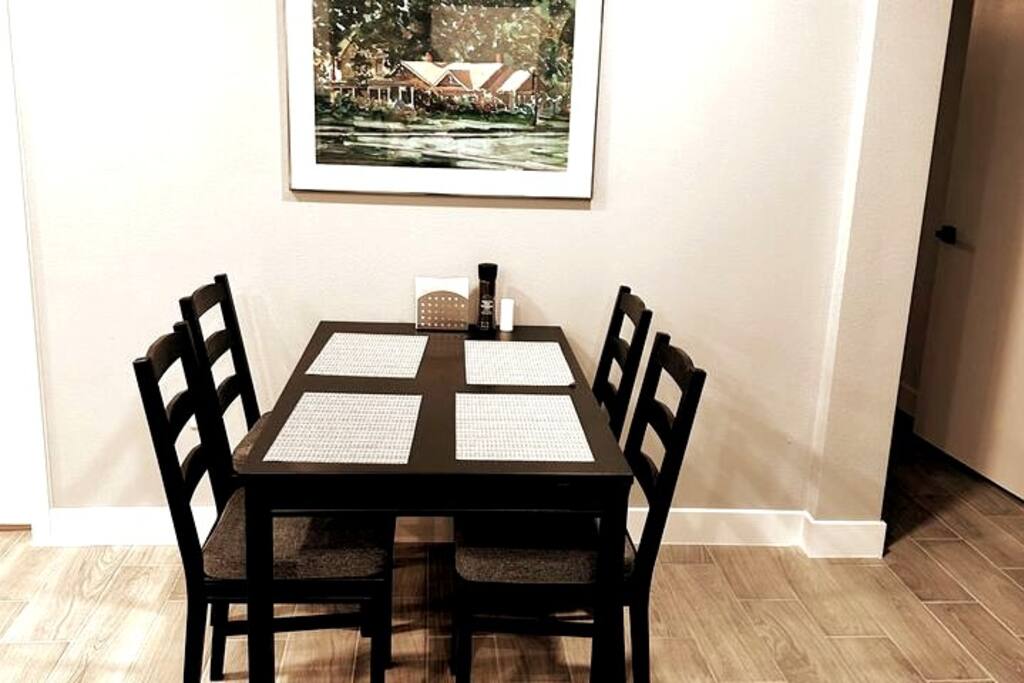 Dining area open to living room and kitchen.