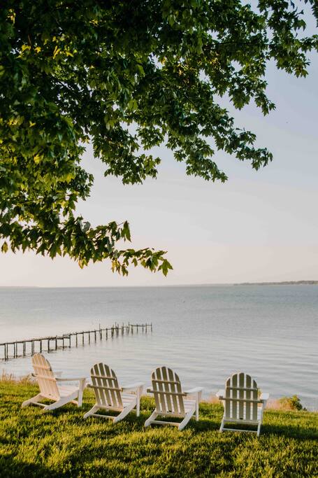 Picture yourself sitting in a classic Adirondack chair with a cocktail or coffee, listening to the water. - Cozy Waterfront Getaway Fireplace/Kayaks/Fire Pit - Locust Hill