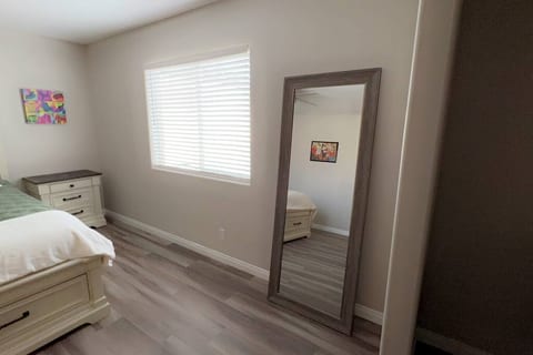 Master Bedroom Photo - California King Bed and Large Mirror