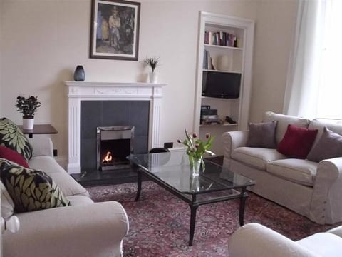 Comfortable sitting room with real fire