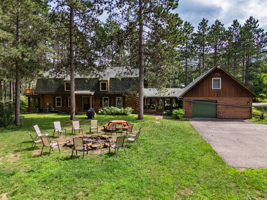 Secluded backyard with fire pit, picnic table with tons of seating, gas grill with propane supplied Secluded backyard with fire pit, picnic table with tons of seating, gas grill with propane supplied - Eagle Bluff Estate - Mauston