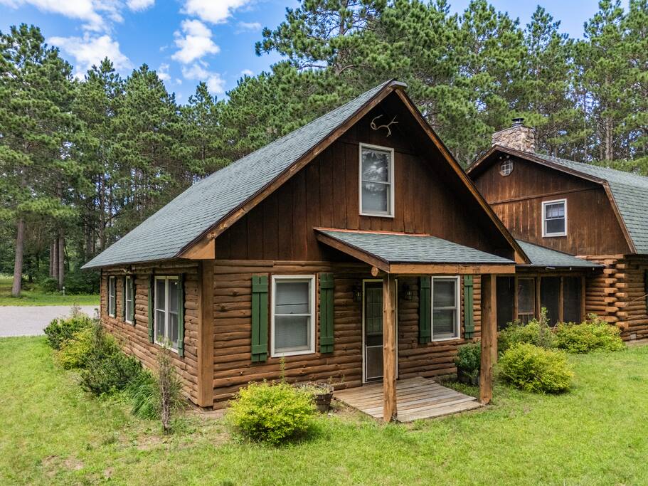 This picture features the cabin in the middle and the lodge to the right. The view is from the front of the home. This picture features the cabin in the middle and the lodge to the right. The view is from the front of the home. - Eagle Bluff Estate - Mauston