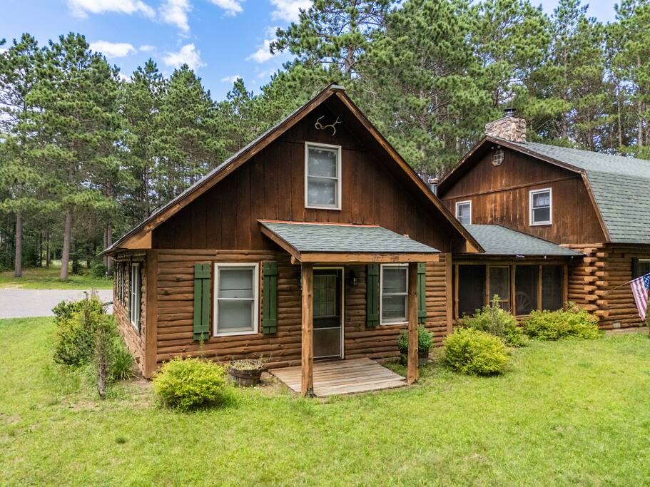 This picture features the cabin in the middle and the lodge to the right. The view is from the front of the home. This picture features the cabin in the middle and the lodge to the right. The view is from the front of the home. - Eagle Bluff Estate - Mauston