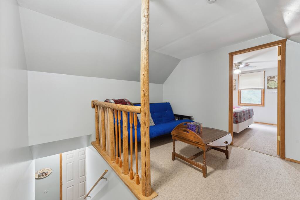 Upstairs cabin loft with queen futon and coffee table Upstairs cabin loft with queen futon and coffee table - Eagle Bluff Estate - Mauston