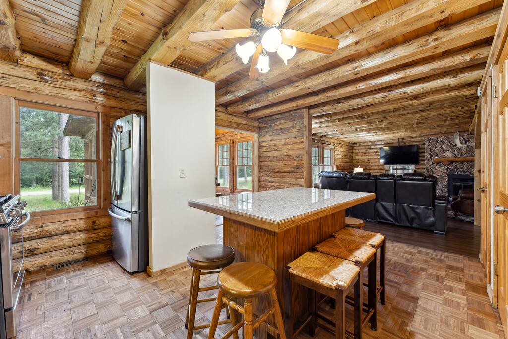 The lodge kitchen has bar stools for the island, air fryer, Keurig, dishwasher, stove, microwave, fridge, pots & pans, dinnerware, blender, tea & tea pot, Keurig (BYO K-Cups) and coffee pot (coffee supplied), small selection of spices and much more. The lodge kitchen has bar stools for the island, air fryer, Keurig, dishwasher, stove, microwave, fridge, pots & pans, dinnerware, blender, tea & tea pot, Keurig (BYO K-Cups) and coffee pot (coffee supplied), small selection of spices and much more. - Eagle Bluff Estate - Mauston