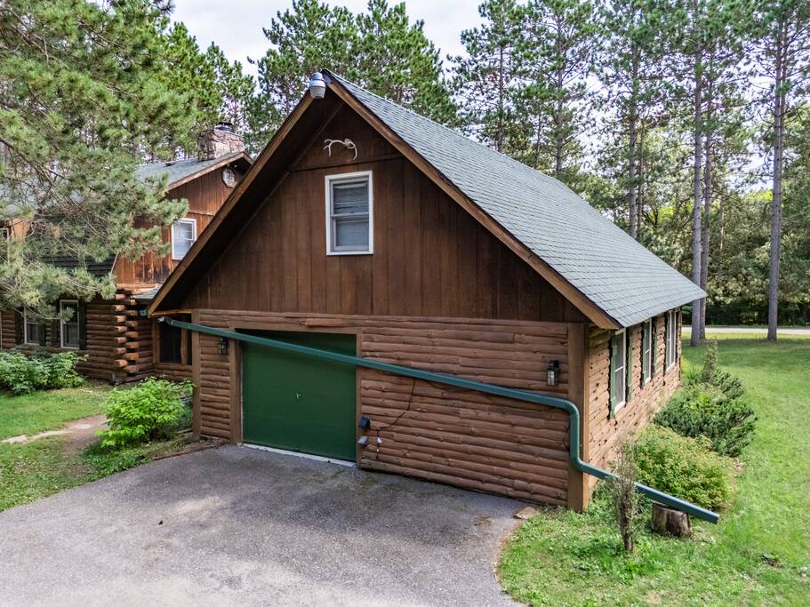 View of the driveway and back of the cabin. View of the driveway and back of the cabin. - Eagle Bluff Estate - Mauston