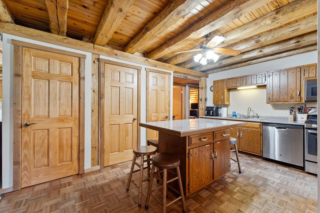 The lodge kitchen has bar stools for the island, air fryer, Keurig, dishwasher, stove, microwave, fridge, pots & pans, dinnerware, blender, tea & tea pot, Keurig (BYO K-Cups) and coffee pot (coffee supplied), small selection of spices and much more. The lodge kitchen has bar stools for the island, air fryer, Keurig, dishwasher, stove, microwave, fridge, pots & pans, dinnerware, blender, tea & tea pot, Keurig (BYO K-Cups) and coffee pot (coffee supplied), small selection of spices and much more. - Eagle Bluff Estate - Mauston