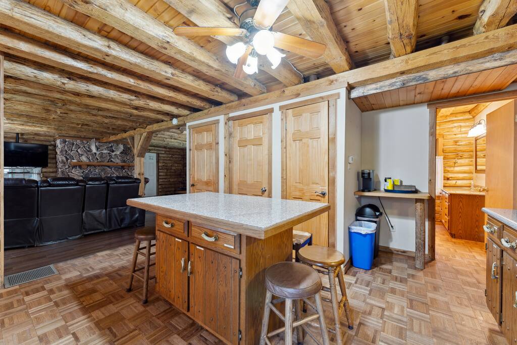 The lodge kitchen has bar stools for the island with additional seating in the four seasons dinning room, cabin kitchen, and breezeway. The lodge kitchen has bar stools for the island with additional seating in the four seasons dinning room, cabin kitchen, and breezeway. - Eagle Bluff Estate - Mauston