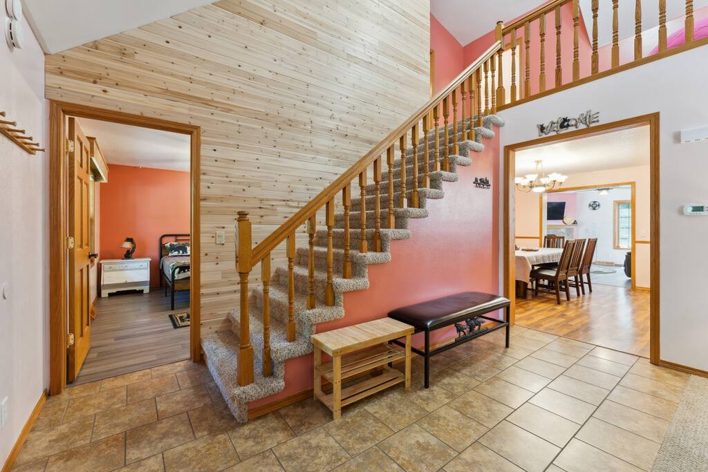 Loft at the top of stairs featuring with bean bag chair, two bedrooms, and full bathroom. Loft at the top of stairs featuring with bean bag chair, two bedrooms, and full bathroom. - Bear Cove Escape - Lyndon Station
