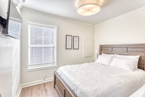 On the nightstand you will find a clock that doubles as a nightlight and sound machine and a spot to plug in your USB and USB-C charging cords. There is also a Roku TV where you can log in to all your favorite streaming apps.