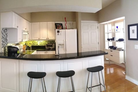 Fully stocked Keurig machine and open kitchen greet you each morning.