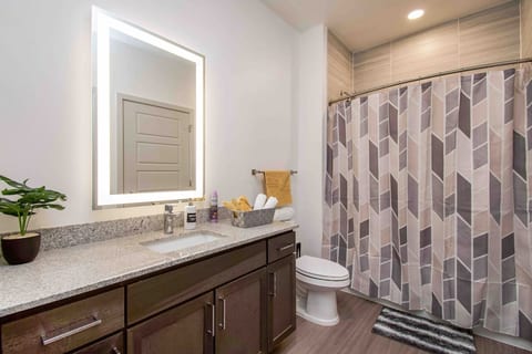 Fluffy towels and luxurious bath products are provided for your conveniences.Hop into our spacious shower and let the warm water wash away your worries. Equipped with a well-lit mirror and ample count