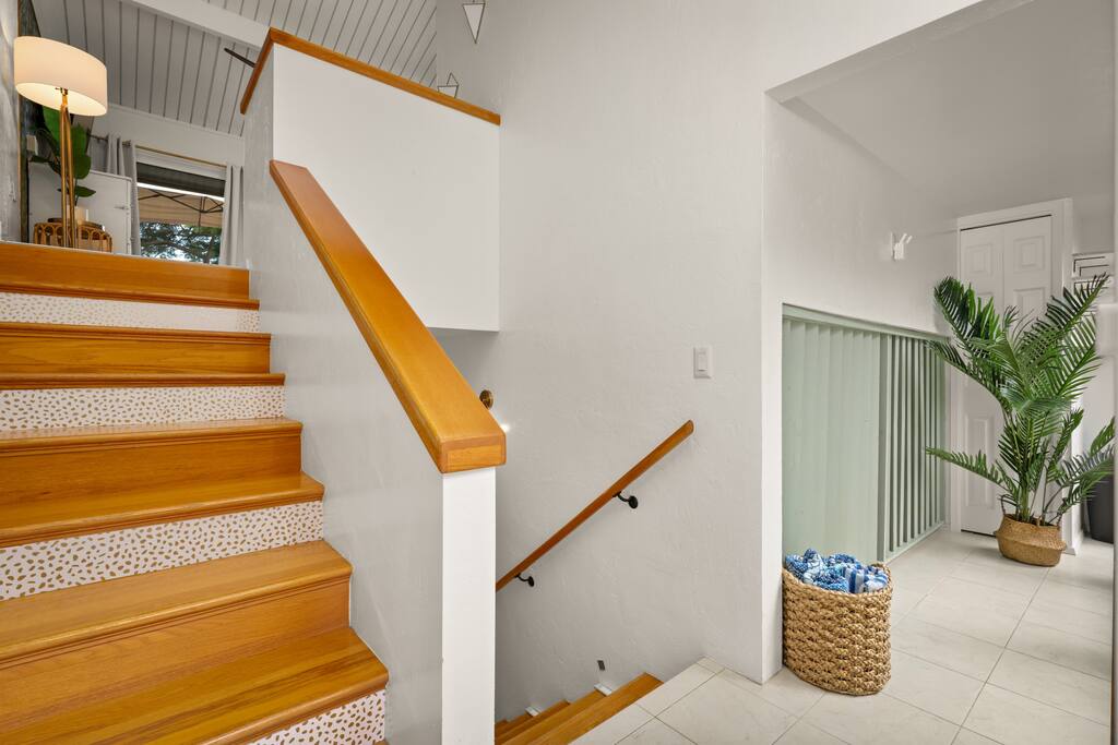 Front entrance. Upstairs to living area & Kitchen. Downstairs to bathroom and bedroom. - Oceanview Kona Condo | A/C, 2 Lanais, Near Golf - Kona