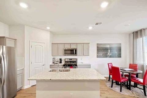 Prepare delicious meals with ease in our well-equipped kitchen area, boasting modern appliances, ample counter space, and a stylish design that inspires culinary creativity.