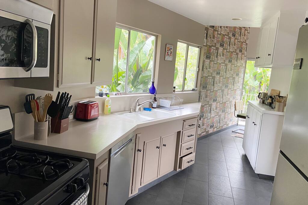 The kitchen is surrounded by greenery on all sides. Our Chef's kitchen is fully equipped for baking, cooking, or just snacking! - Stunning Laurel Canyon-Best Location-Great Views! - West Hollywood