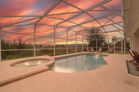 Dive into bliss in the pool beneath the sunroof, where rays of sunshine create a tranquil aquatic escape.