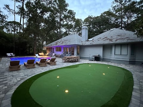 New backyard pool and putting green