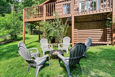 Fire-pit seating area in the front of the property near driveway. BYOwood