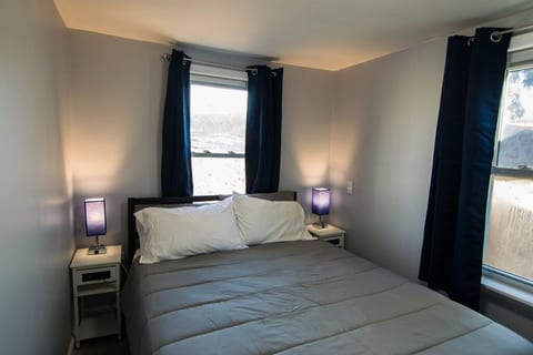 The bedroom has a queen sized bed. The mattress is an Ikea haguesund "medium firm" with a plush topper for your comfort.
Please note that this room is a bit narrow -- there's about 15" on either side of the bed.