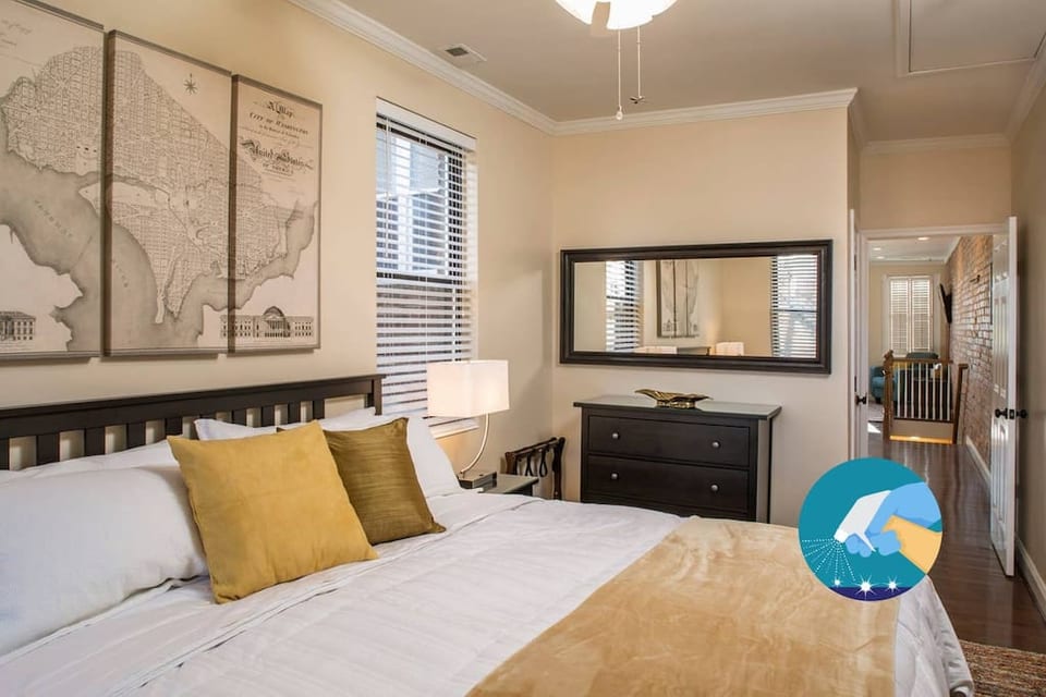 Spacious bedroom with king-sized plush mattress.