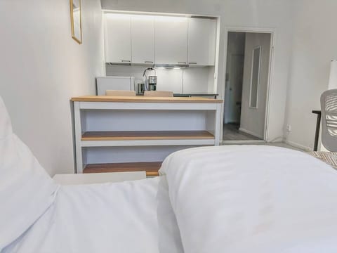 In this minimalistically decorated apartment everything is easy to find!
This is the main queen bed, which is always equipped with full satin, hotel grade sheets!
For environmental and functionality purposes, the apartment does not have a TV.