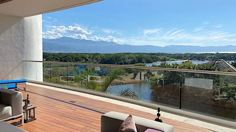 The Residence 4 BR Deck with view of the Ameca River, the Bird Sanctuary and Puerto Vallarta in the distance.