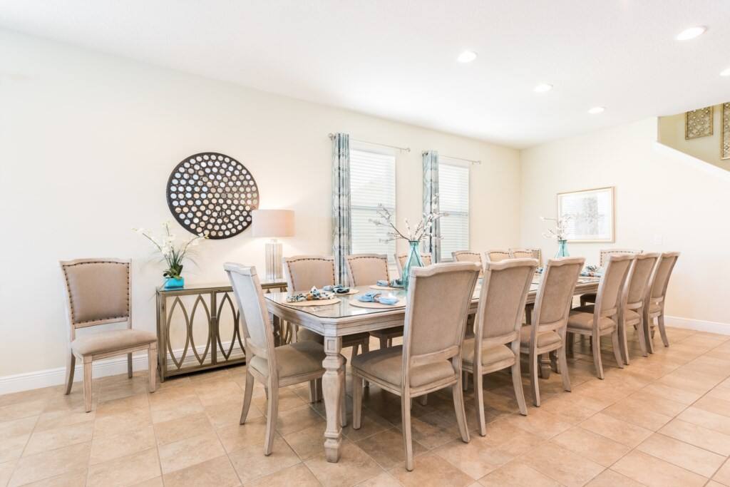 Enjoy dinner at our spacious dining table. - Disney Villa, Luxury 10 bd/ba, Pool, Resort Access - Kissimmee