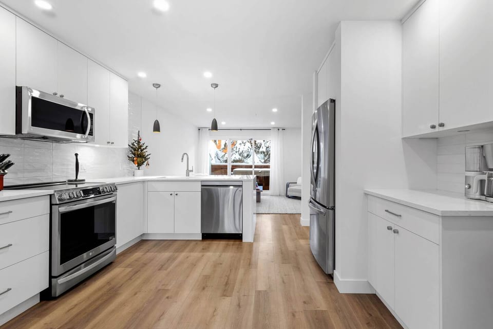 Main kitchen that has been fully remodeled with brand new appliances. The kitchen is fully stocked with everything needed to enjoy meals with family & friend's. 