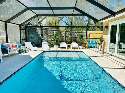 12x25' heated, salt water pool with sunledge. We love having the enclosure as we can enjoy it anytime of day with no pesky bugs!