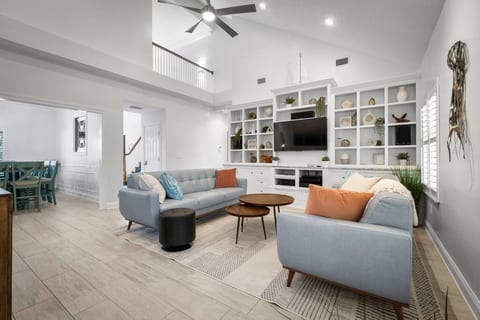 High end metal artwork is outstanding in this home! We love the open concept living where the kitchen, living area, and dining area all flow together but yet defined enough to create its own space.