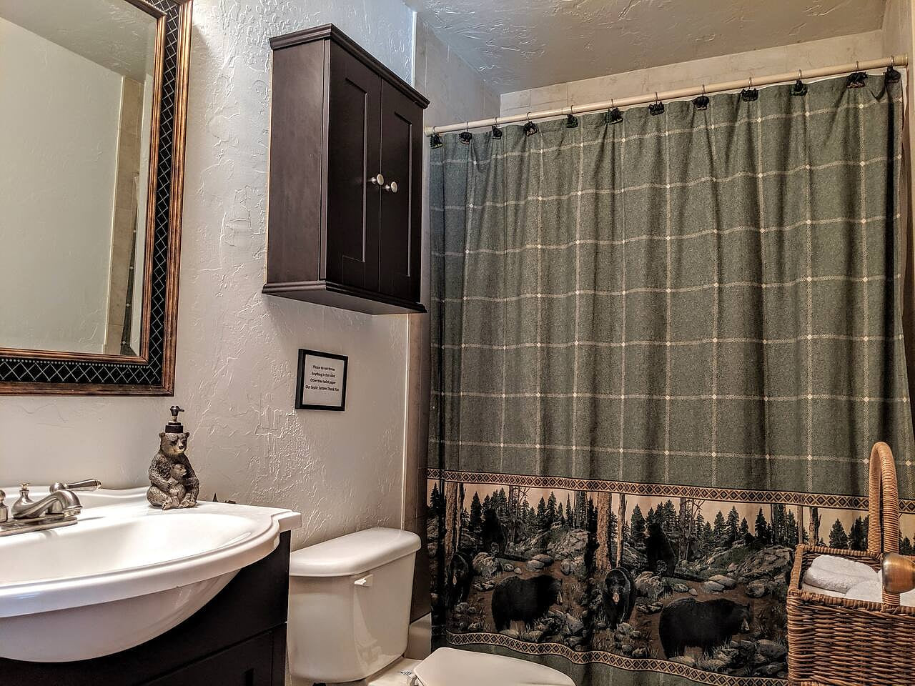 Main floor updated full bathroom, the bathroom is equipped with shampoo, conditioner and body wash