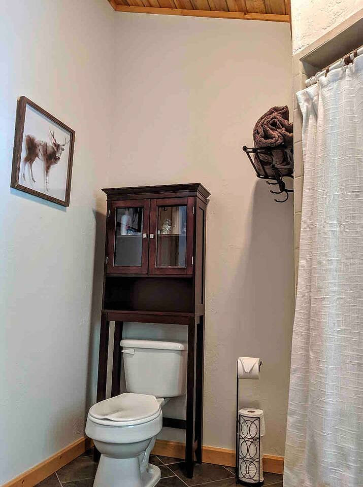Master ensuite bathroom with a separate shower and soaking tub. The bathroom is equipped with shampoo, conditioner, body wash and a hairdryer.