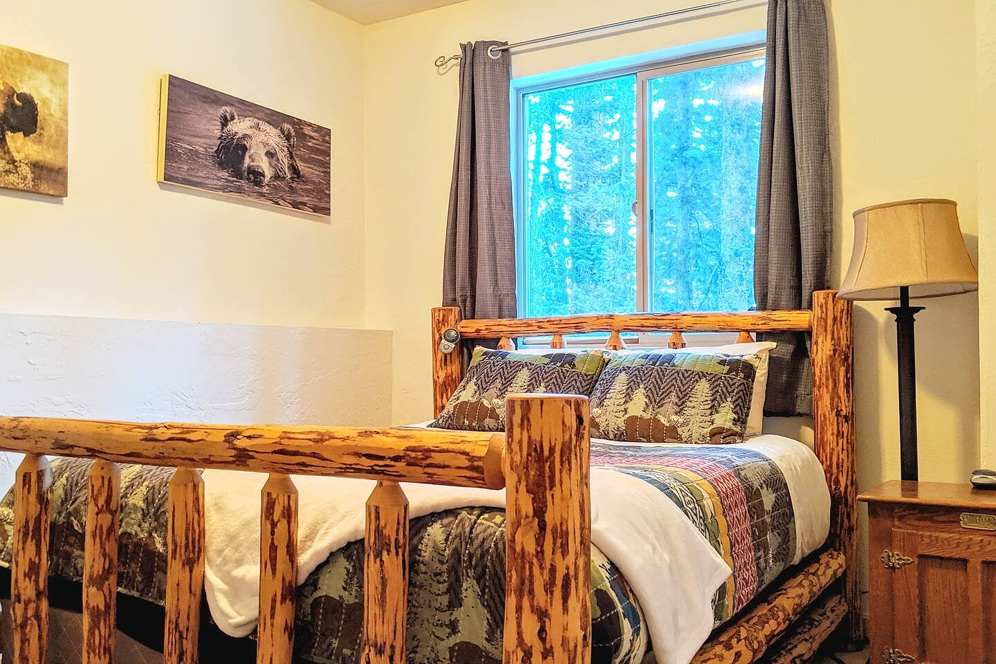 Private downstairs 2nd master suite with a log pine Queen bed, ensuite bathroom, that will give you privacy from the rest of the house.