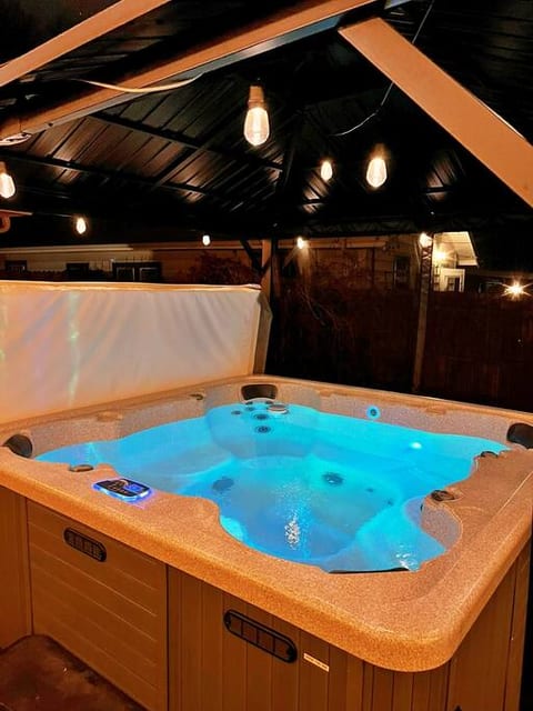 Private Hot Tub with cosy roof open all year around