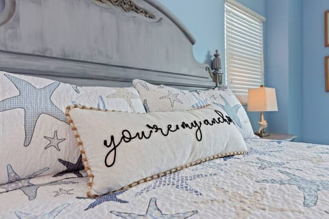 Master room with a king bed