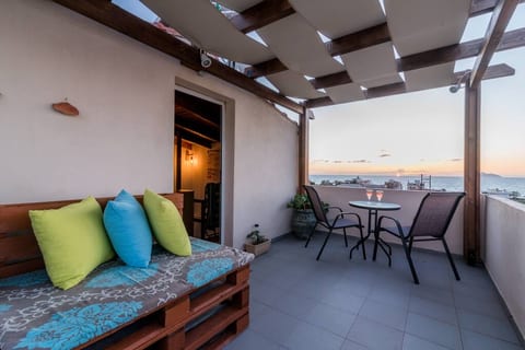 Unforgetable moments in tha large veranda with a glass of wine