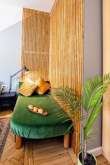 Green velvet sofa-bed