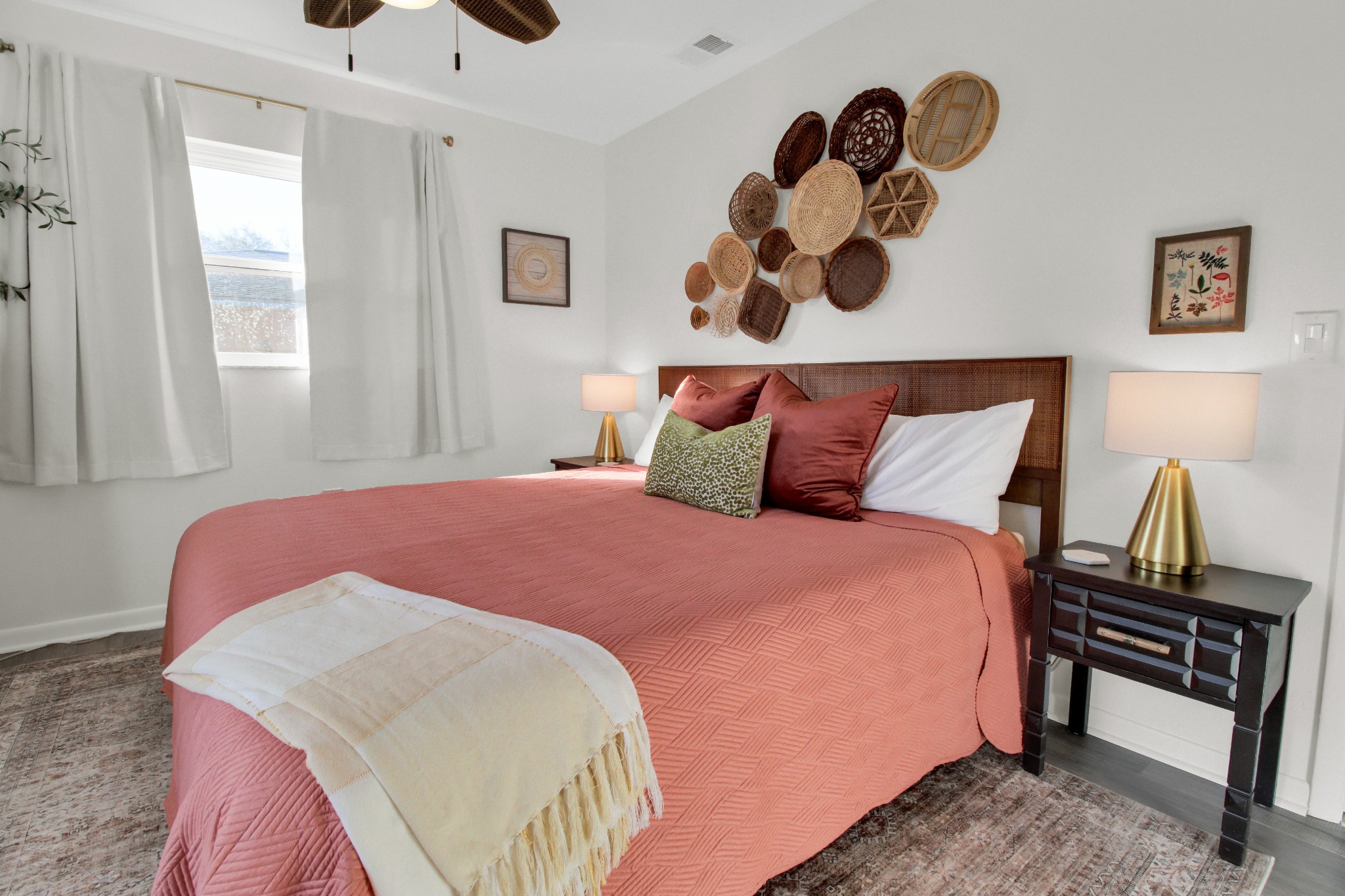 Guest Bedroom with fun basket wall - Bradenton Boho Bungalow - Bradenton