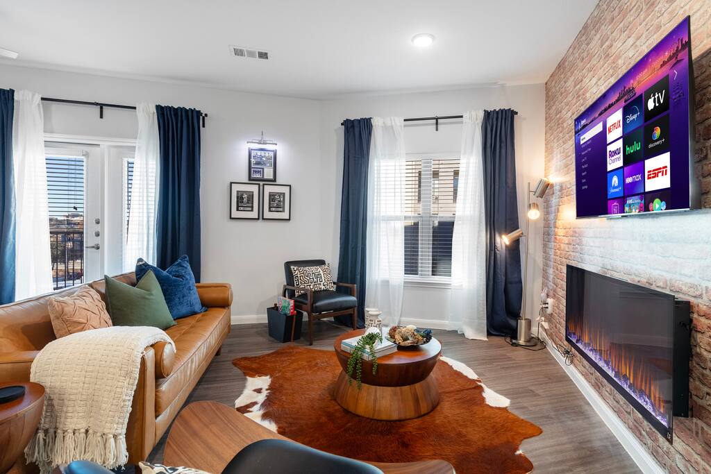 Wind down in this great space created with you in mind! Great for conversations with family and friends, relaxing, and watching a movie on the 55-inch Smart TV and fireplace.