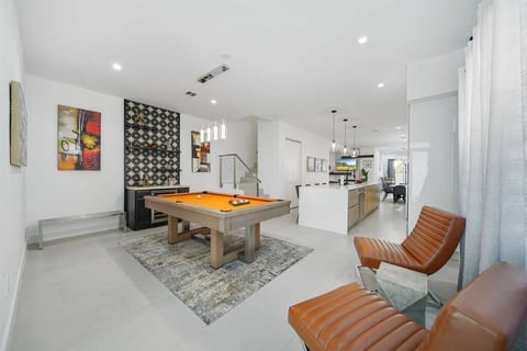 Spacious floor plan with poll table and bar area