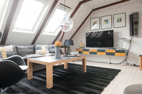 Penthouse-style with big terrace.