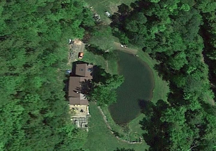 secluded-open-air-cabin-spring-fed-swimming-pond/