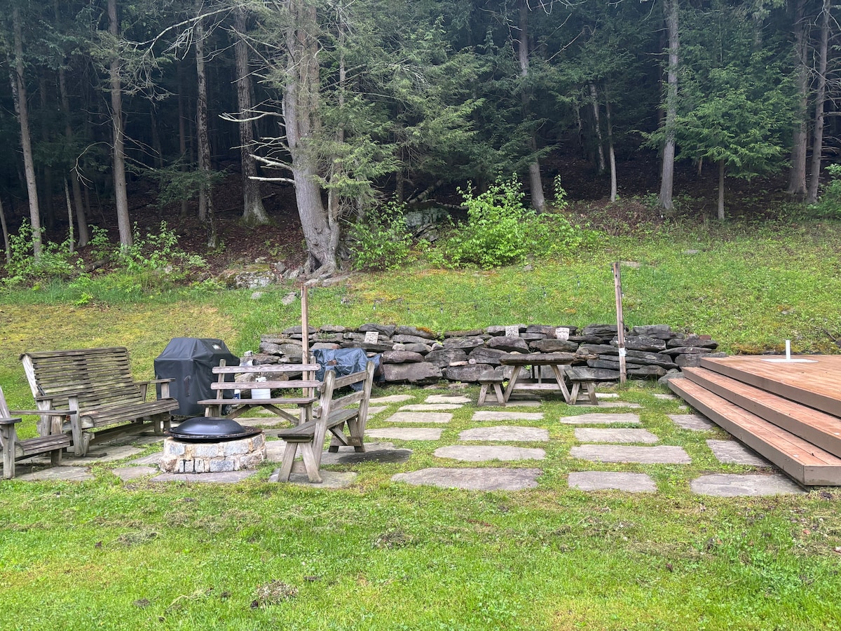 secluded-open-air-cabin-spring-fed-swimming-pond/