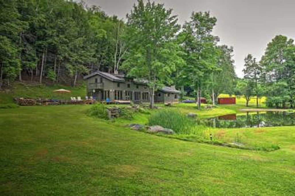 secluded-open-air-cabin-spring-fed-swimming-pond/