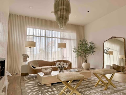Welcome to Kirby Haus! Experience luxury living in the heart of Rice Village. The featured main living area boasts more than 2000 sq ft of expansive open space, complemented by 12 ft high ceilings and natural light, making it perfect for gatherings.
