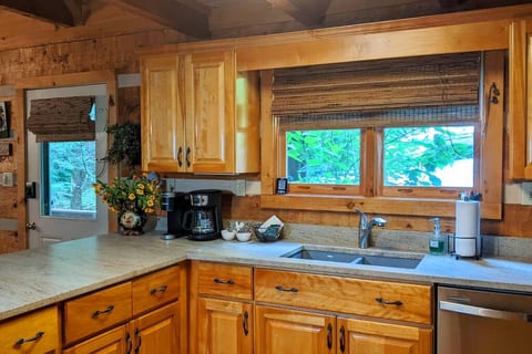 New "leathered" granite countertops, July 2023.