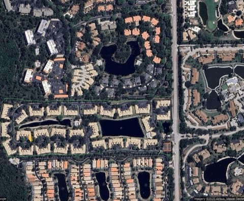 Image of Village of Emerald Bay Condominum Complex and where our condo is located in yellow (we are in toward back of condo complex)