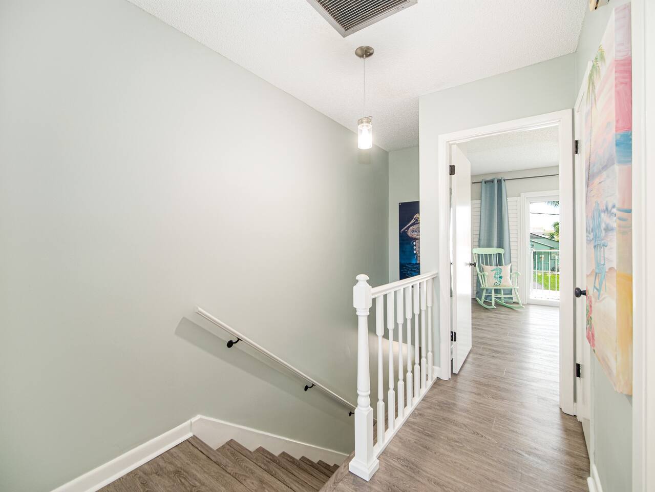 Hallway to primary bedroom - Townhouse: Cute and comfy, 3 blocks to the beach - Jacksonville Beach